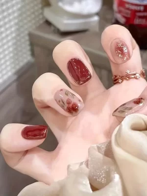 24 stk Gullfargede glitter falske negler i kort firkantet form, med blomsterdesign